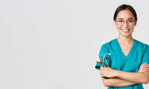 covid-19-coronavirus-disease-healthcare-workers-concept-close-up-of-confident-professional-female-doctor-nurse-in-glasses-and-scrubs-standing-white-background-cross-arms (1)
